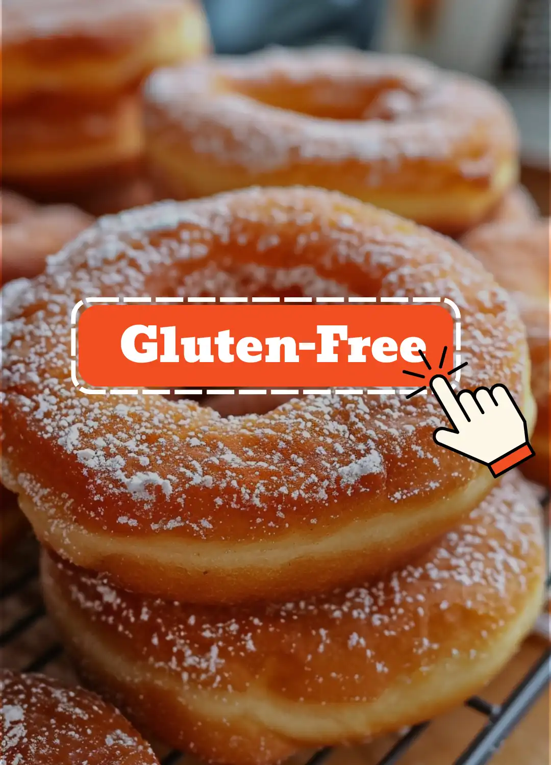 Freshly made gluten-free donuts, lightly dusted with powdered sugar, golden and crispy.
